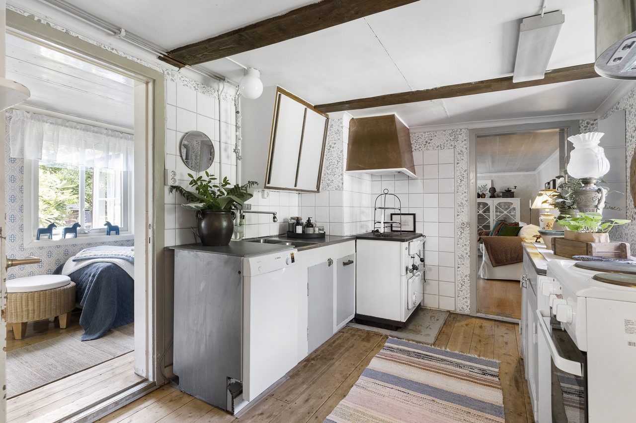 Här blandas några originaldelar med smakfullt valda köksdetaljer.