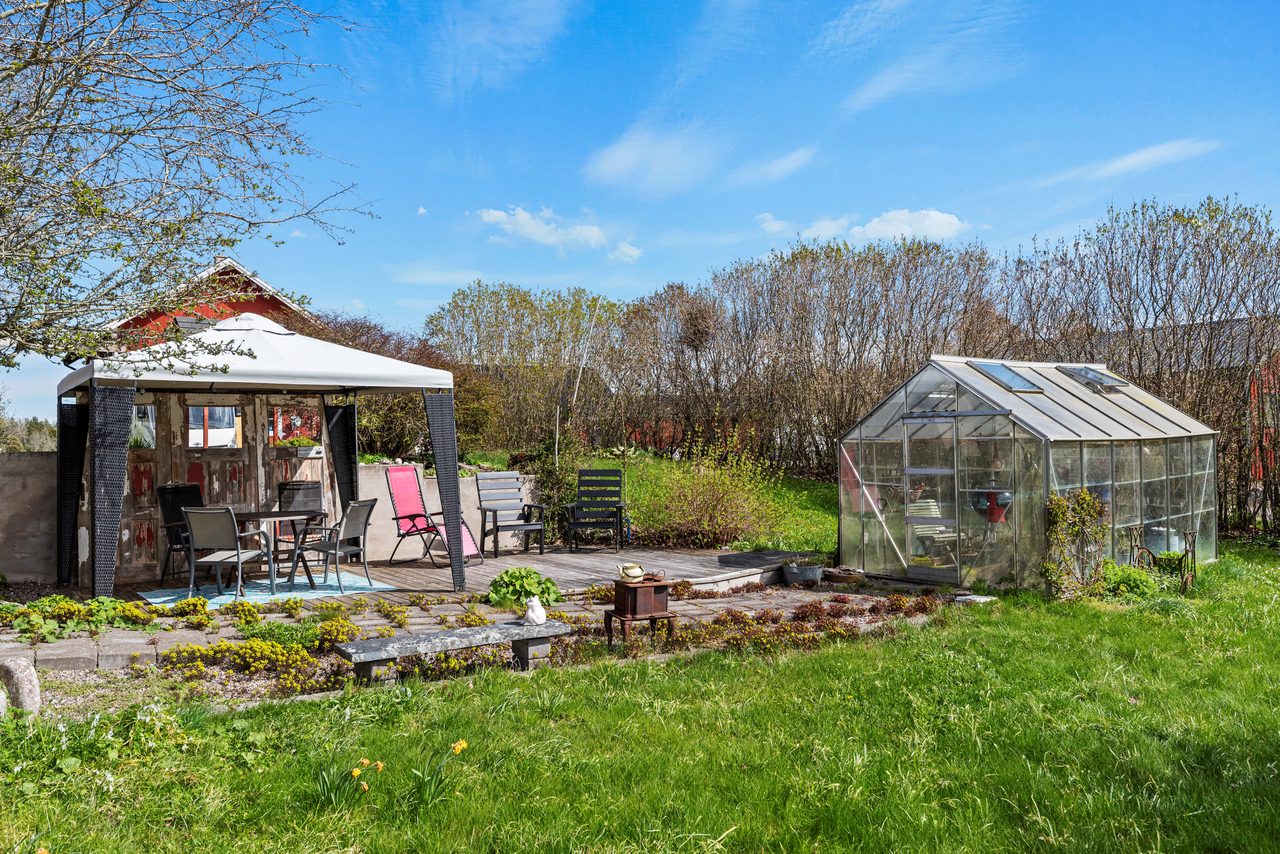 Växthus intill boningshus