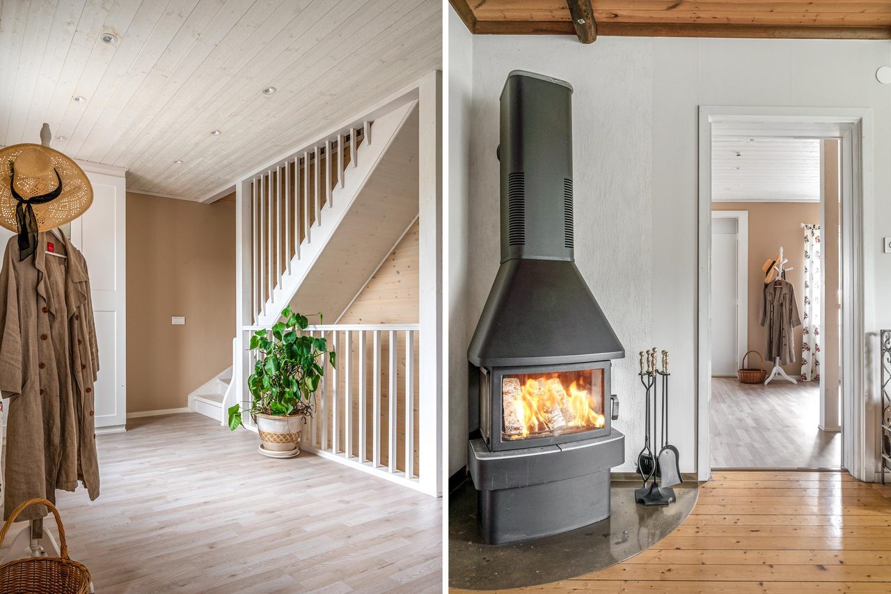 I vardagsrummet står en värmande braskamin