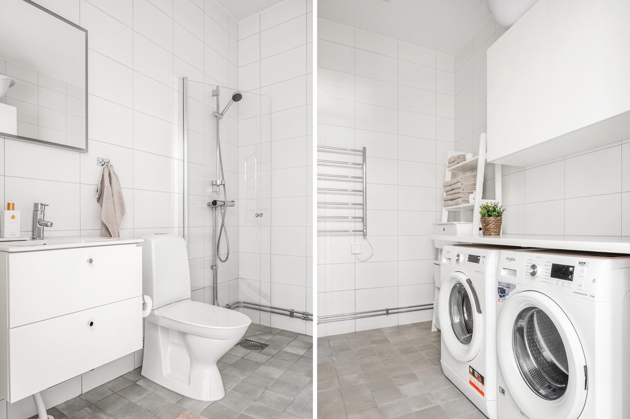 Stort badrum med plats för badkar, praktisk tvättdel