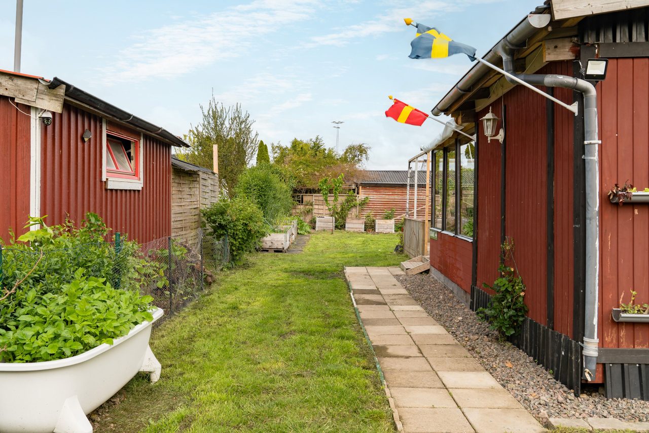 Kopparhögarnas koloniområde, gång S stuga 21