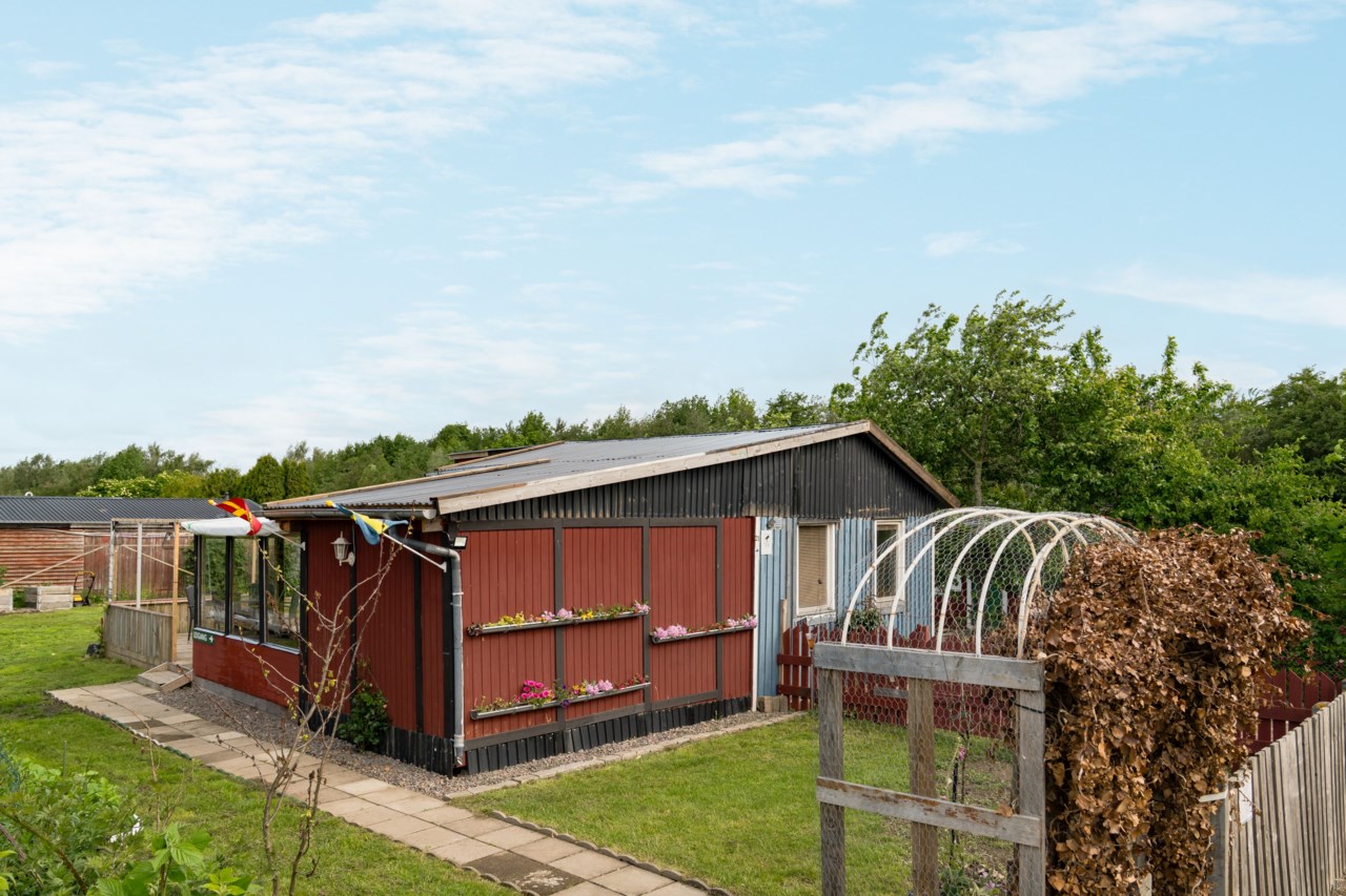 Kopparhögarnas koloniområde, gång S stuga 21